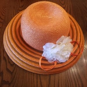 Elegant Orange Women's Hat with White Flower Accent